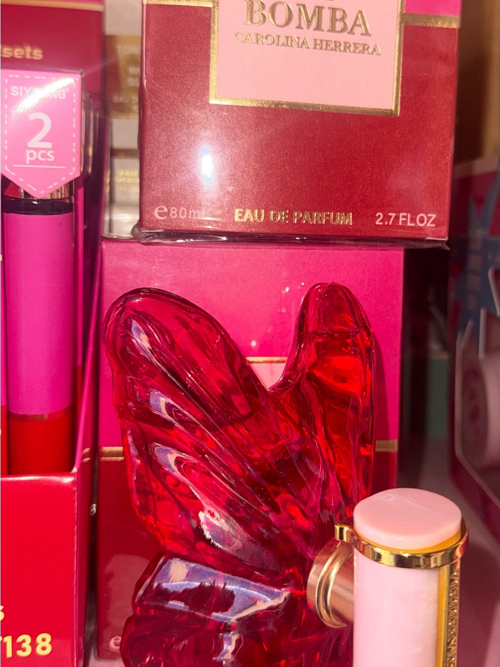 Carolina Herrera Bomba Butterfly Red Glass Bottle with Pink Accents